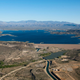 Energy harvested from evaporation can reduce half the amount of water lost to natural evaporation, according to new research. Water-strapped cities with growing populations and energy needs could benefit most, including greater Phoenix which is served by the above reservoir and irrigation system fed by the Colorado River. (Image: Central Arizona Project)